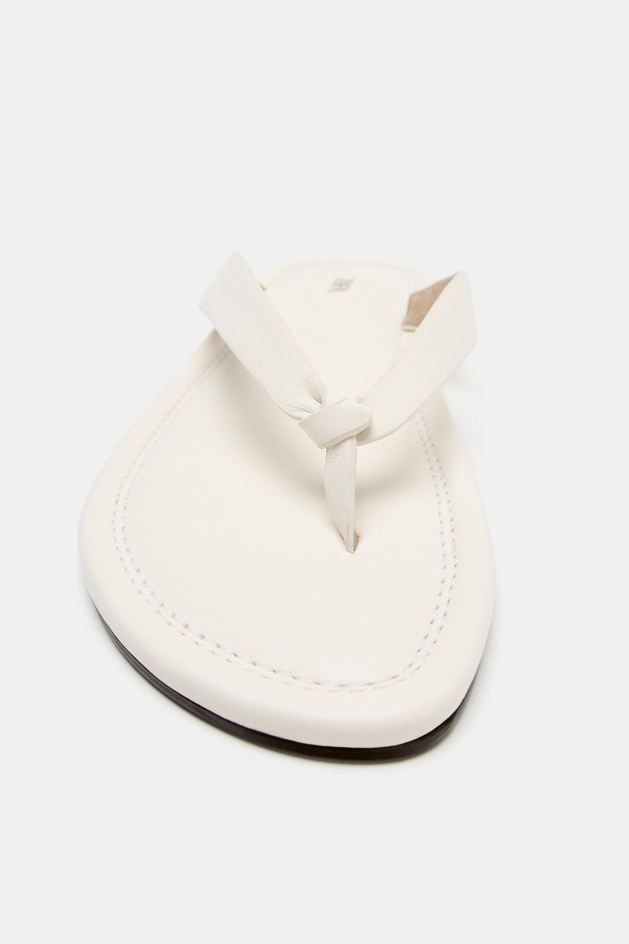 SANDALES PLATES EN CUIR